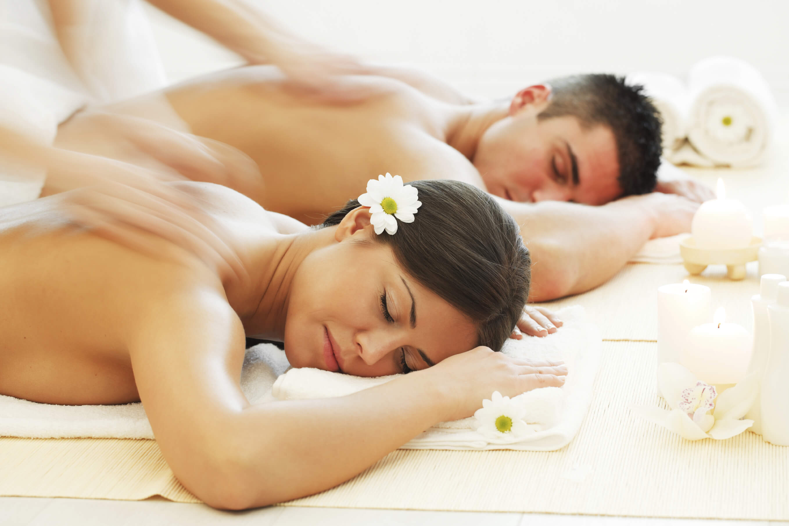 couples massage in white robes